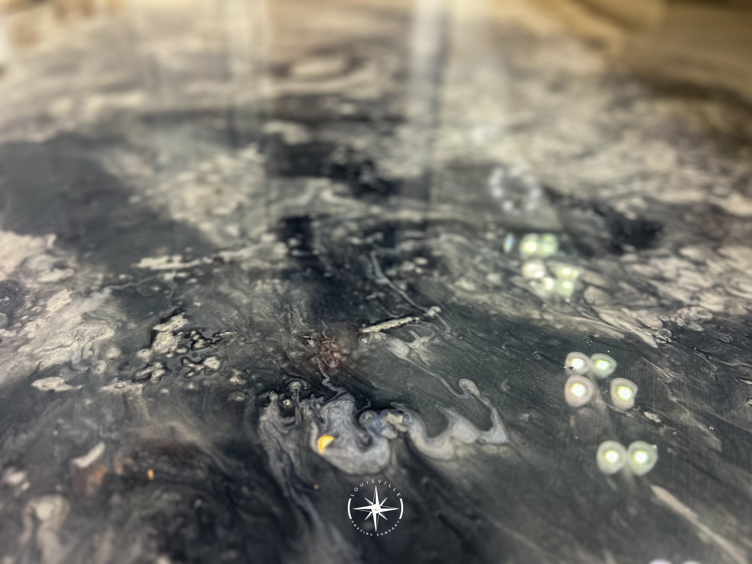 Durable epoxy, polyurethane, and flake concrete coatings for residential, commercial, and garage floors in Louisville and Bullitt County.