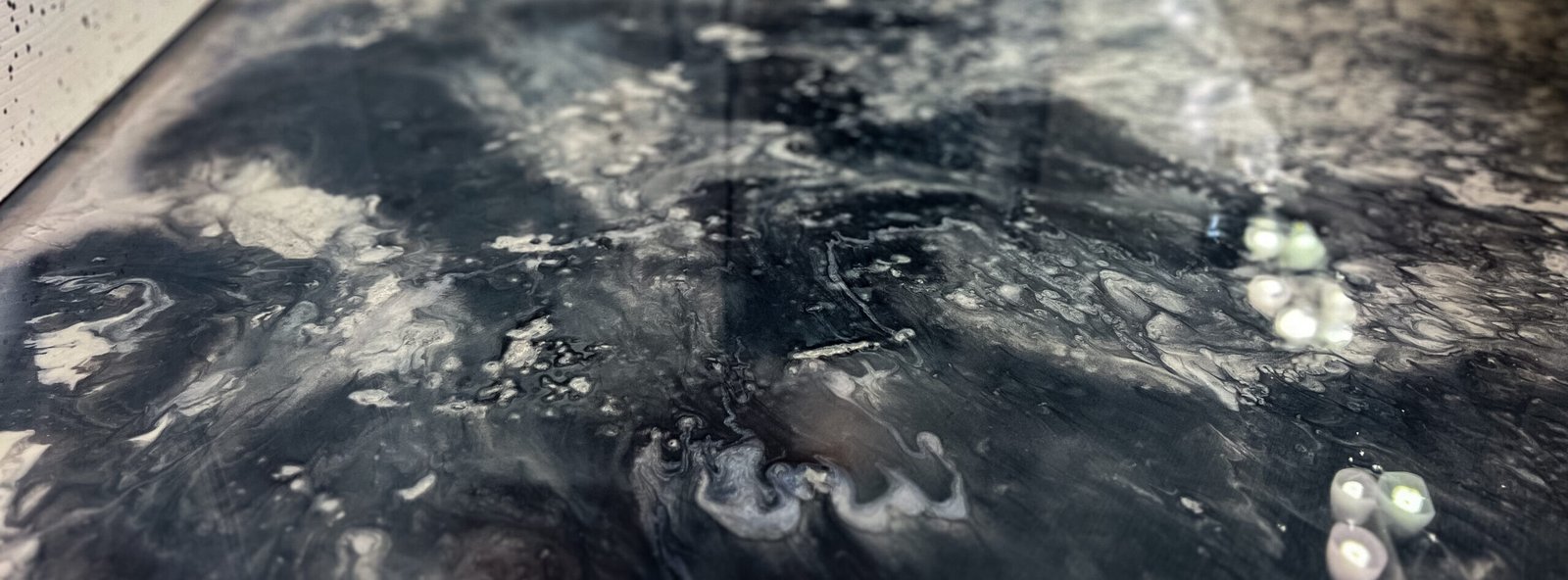 Wide View Of A Black White And Silver Metallic Epoxy Floor